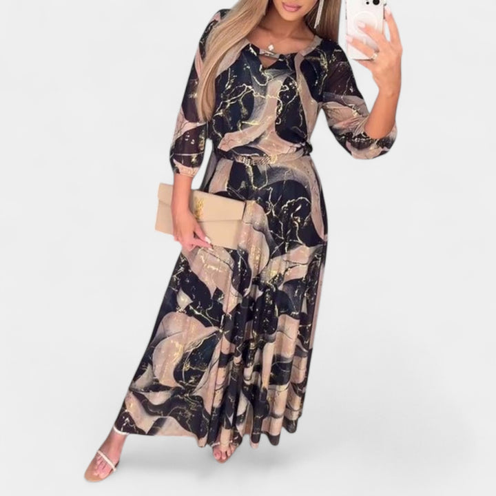 Gabriela – Elegantna šifonska obleka z motivi in 3/4 rokavi