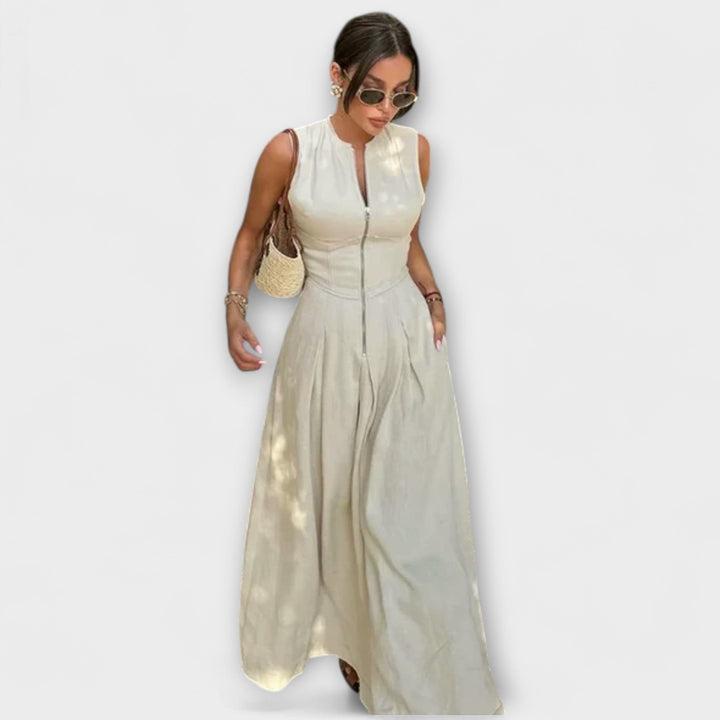 Kratka obleka brez rokavov s plisiranjem in tesnim krojem midi