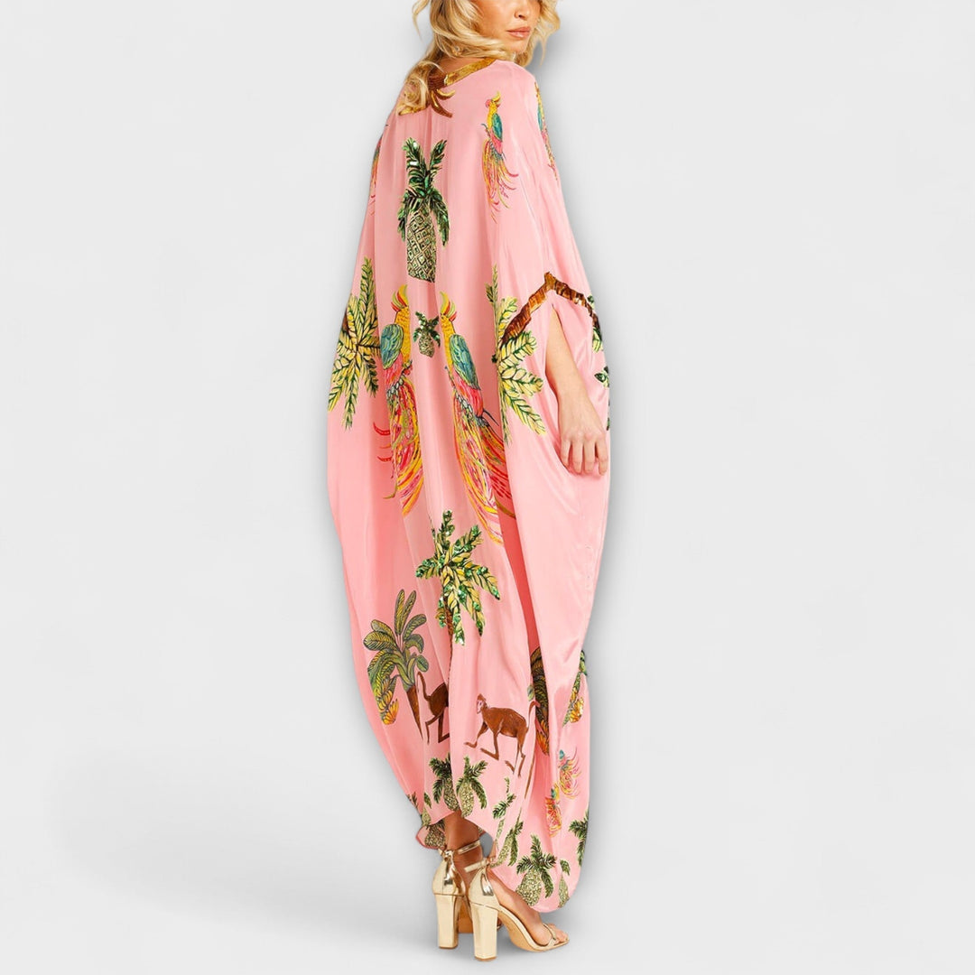 Linda - Impresivna obleka z asimetričnimi naramnicami in potiskom kokosovih palm